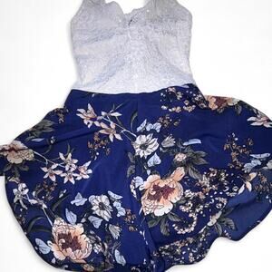 Blue floral romper with white